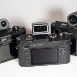 Image shows Leica M camera with Leica electronic viewfinders: M240, M11-P, M10 Monochrom (l-r)