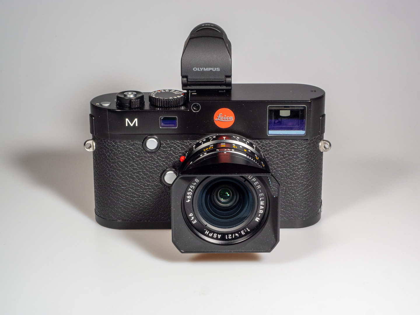 Image shows Leica M (Typ 240) with mounted Olympus VF-2 electronic viewfinder