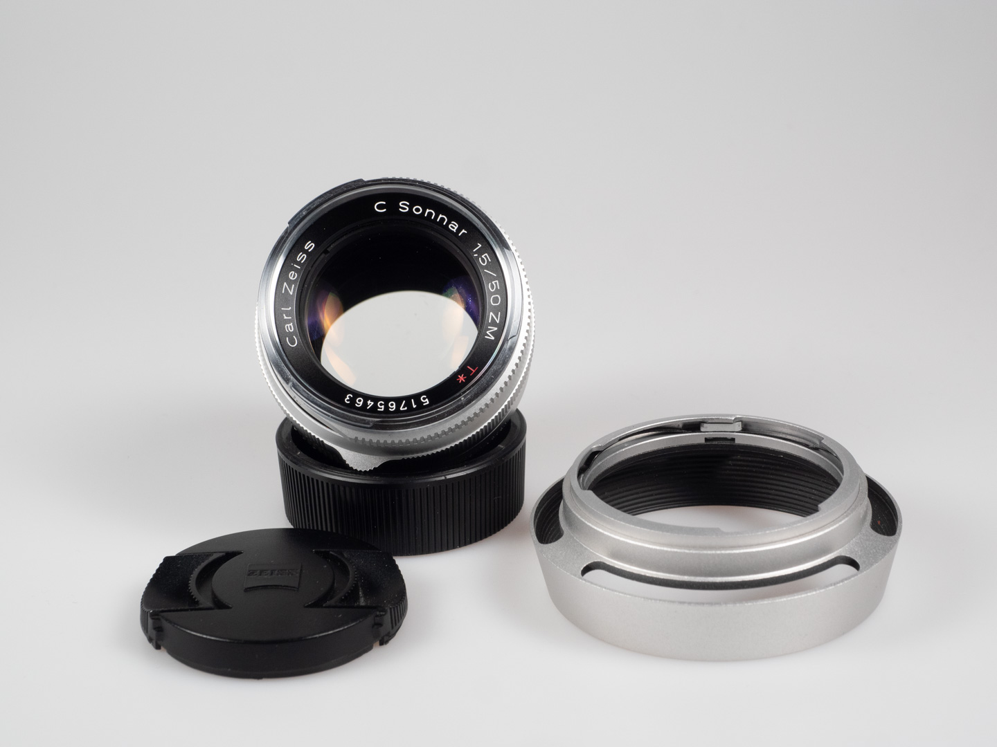 Product image shows Zeiss ZM C lens, Sonnar 50/1.5, with hood from third party supplier, Haoge