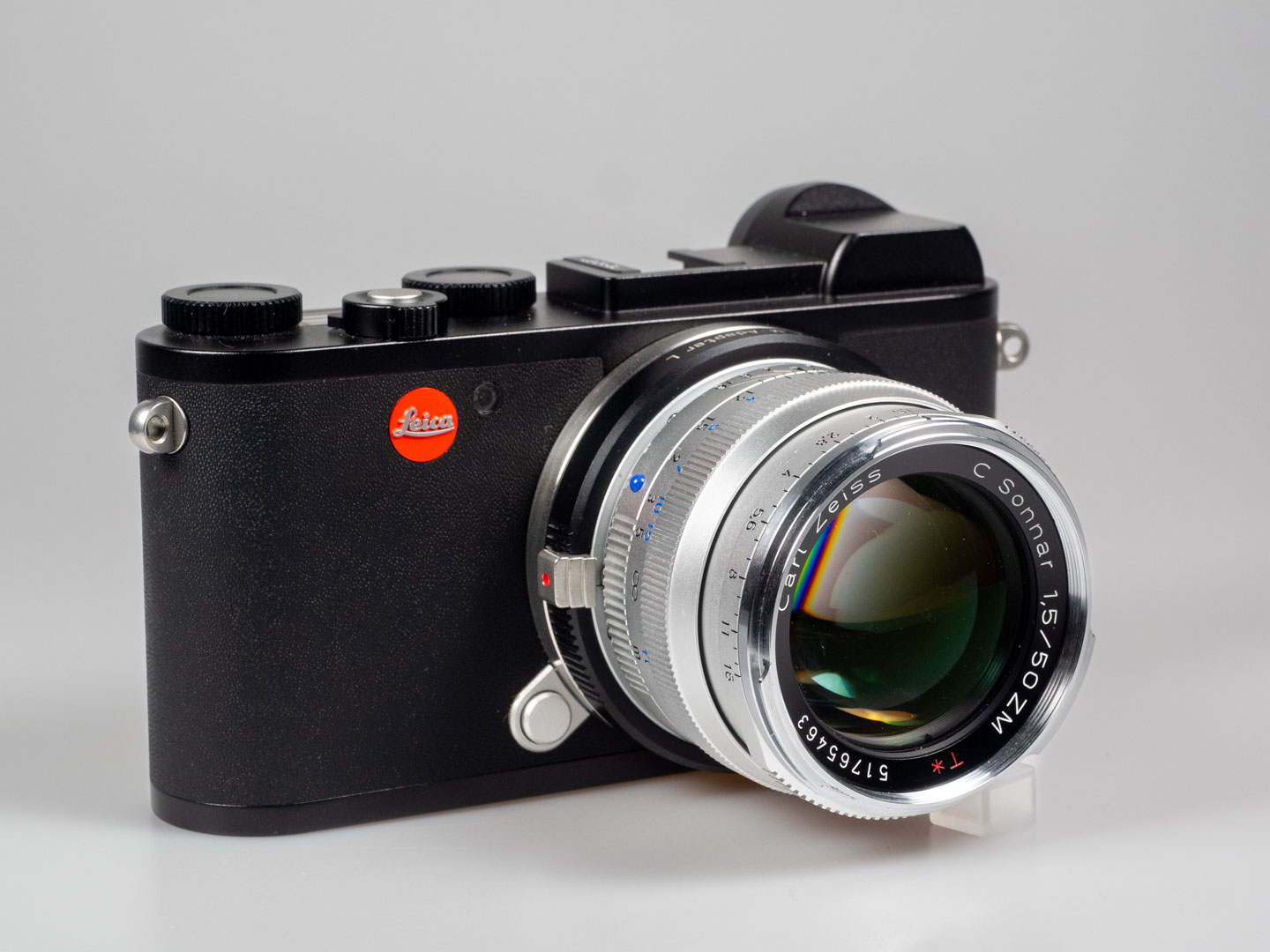 Product image shows Zeiss ZM C lens, Sonnar 50/1.5, attached on Leica CL digital system camera