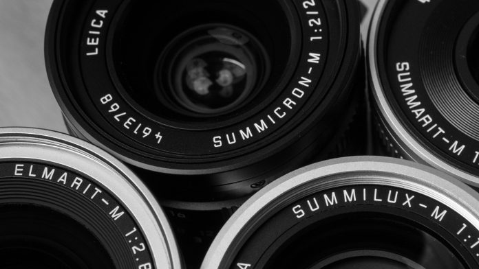 OLYMPUS DIGITAL CAMERA Product image showing different Leica lens names