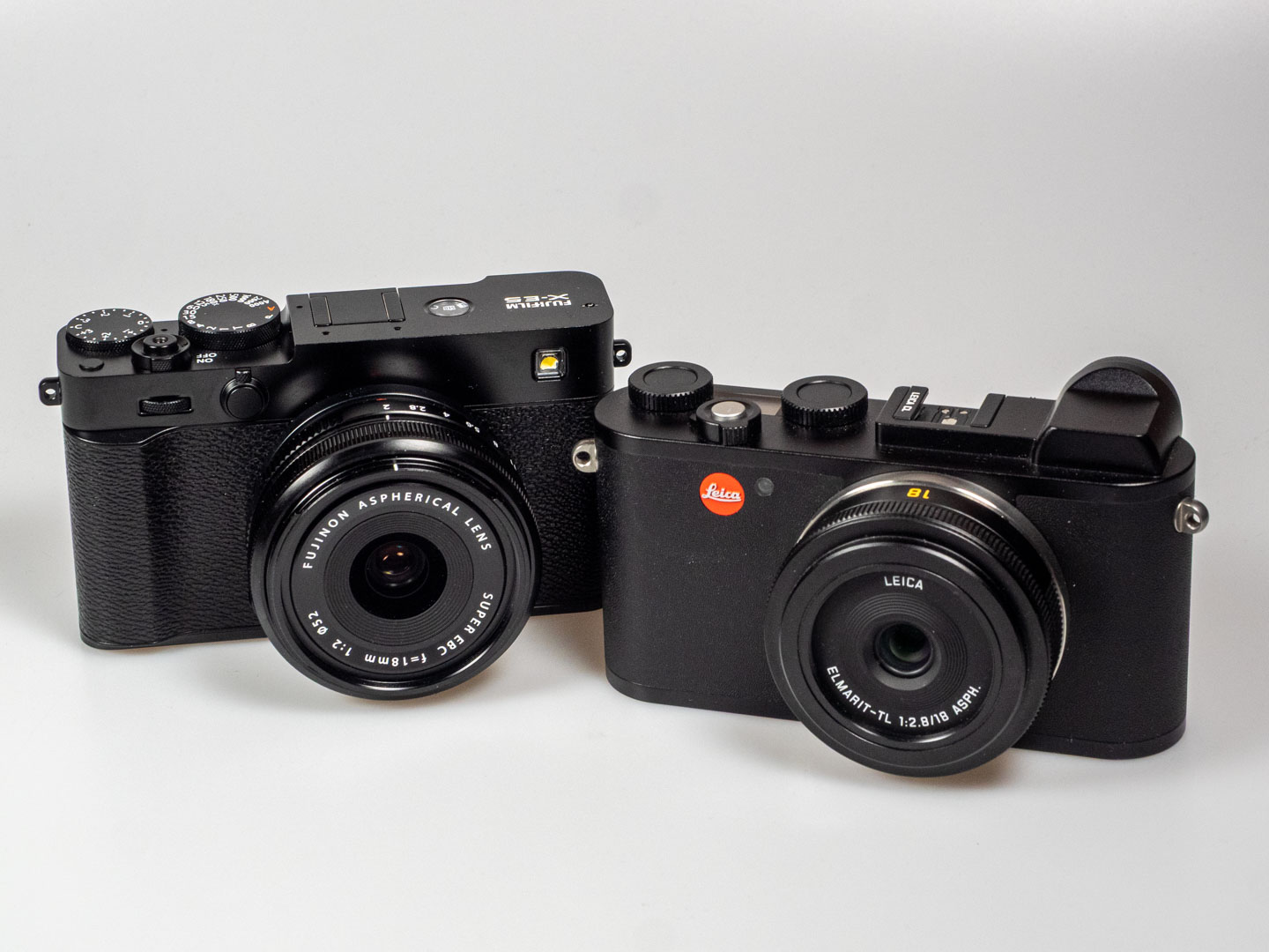 Leica vs. Fujifilm: Product image shows Leica CL and Fujifilm X-E5.