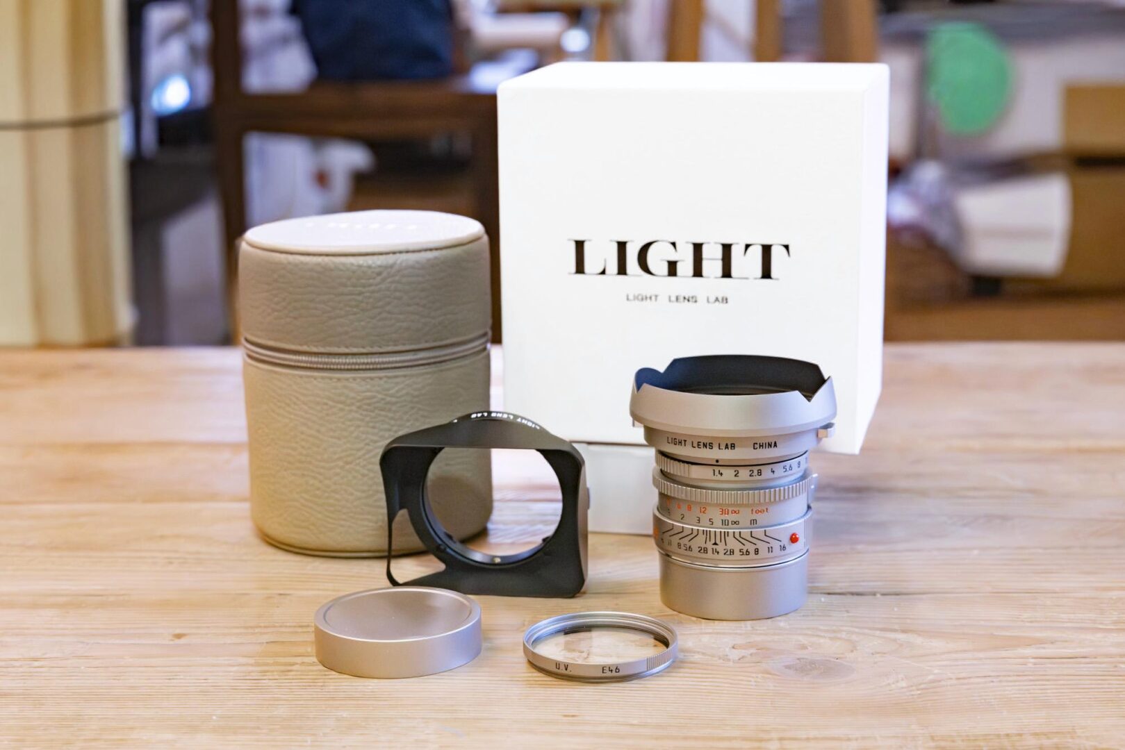 Light Lens Lab 35mm f/1.4 AA in titanium finish, plus accessories