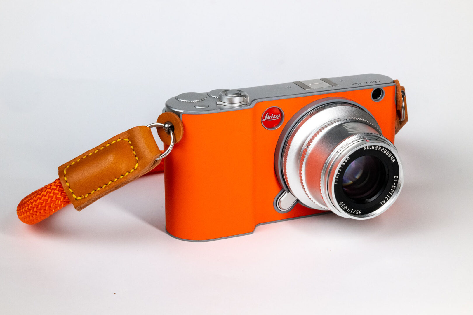 Leica TL2 in orange T-Snap case and TTArtisan 35mm f/1.4 APS-C lens for L-Mount