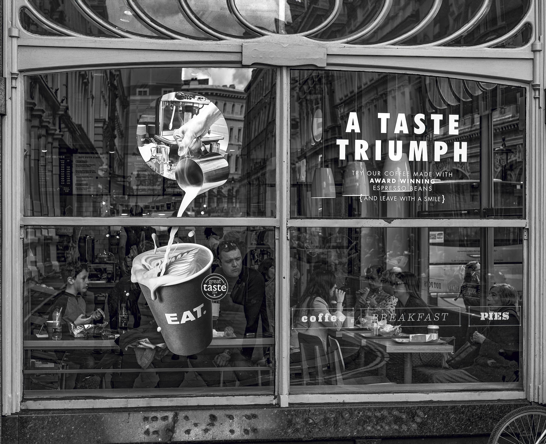 Cafe window with reflections and graphics on glass