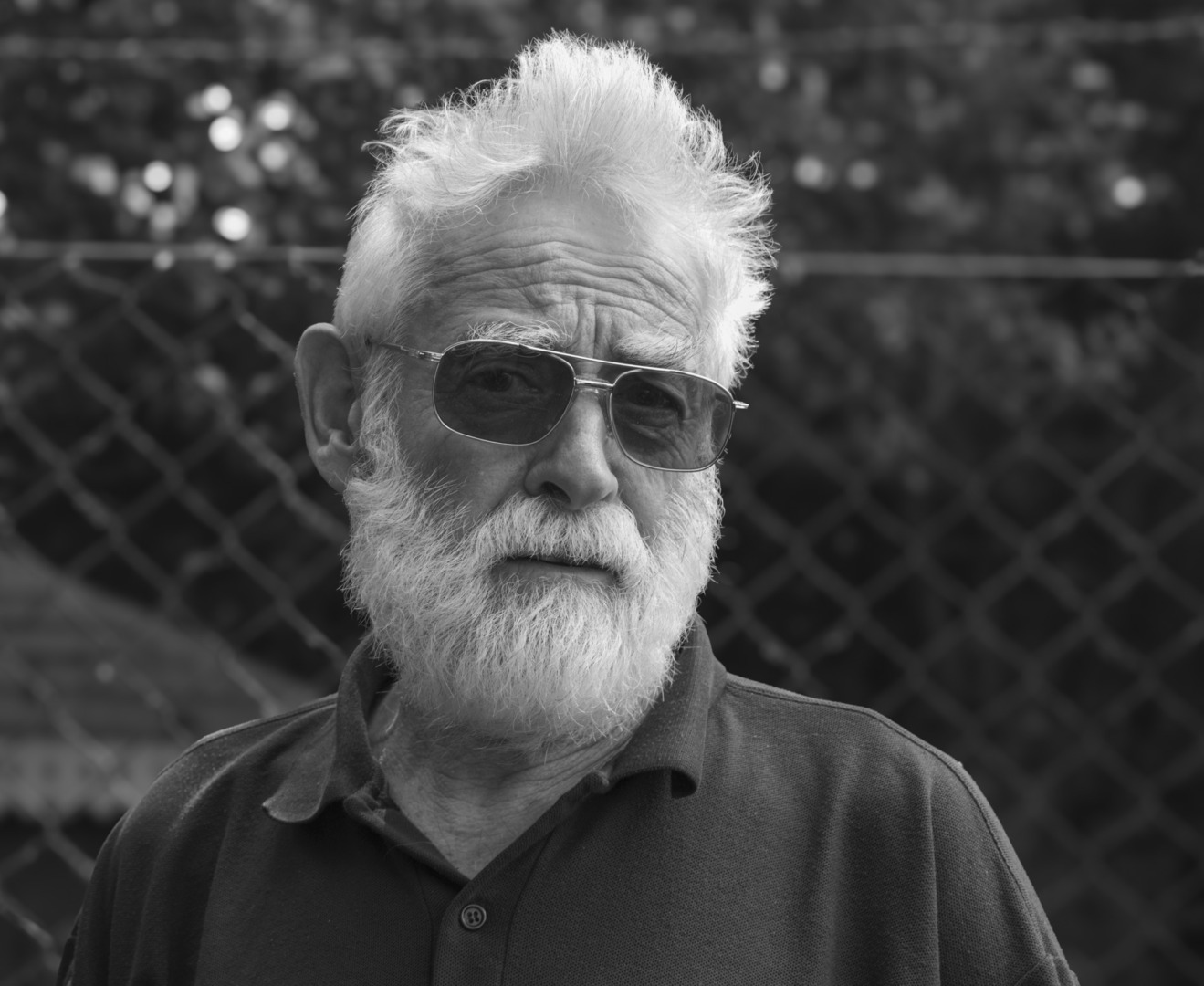 Portrait of gentleman with white hair and beard