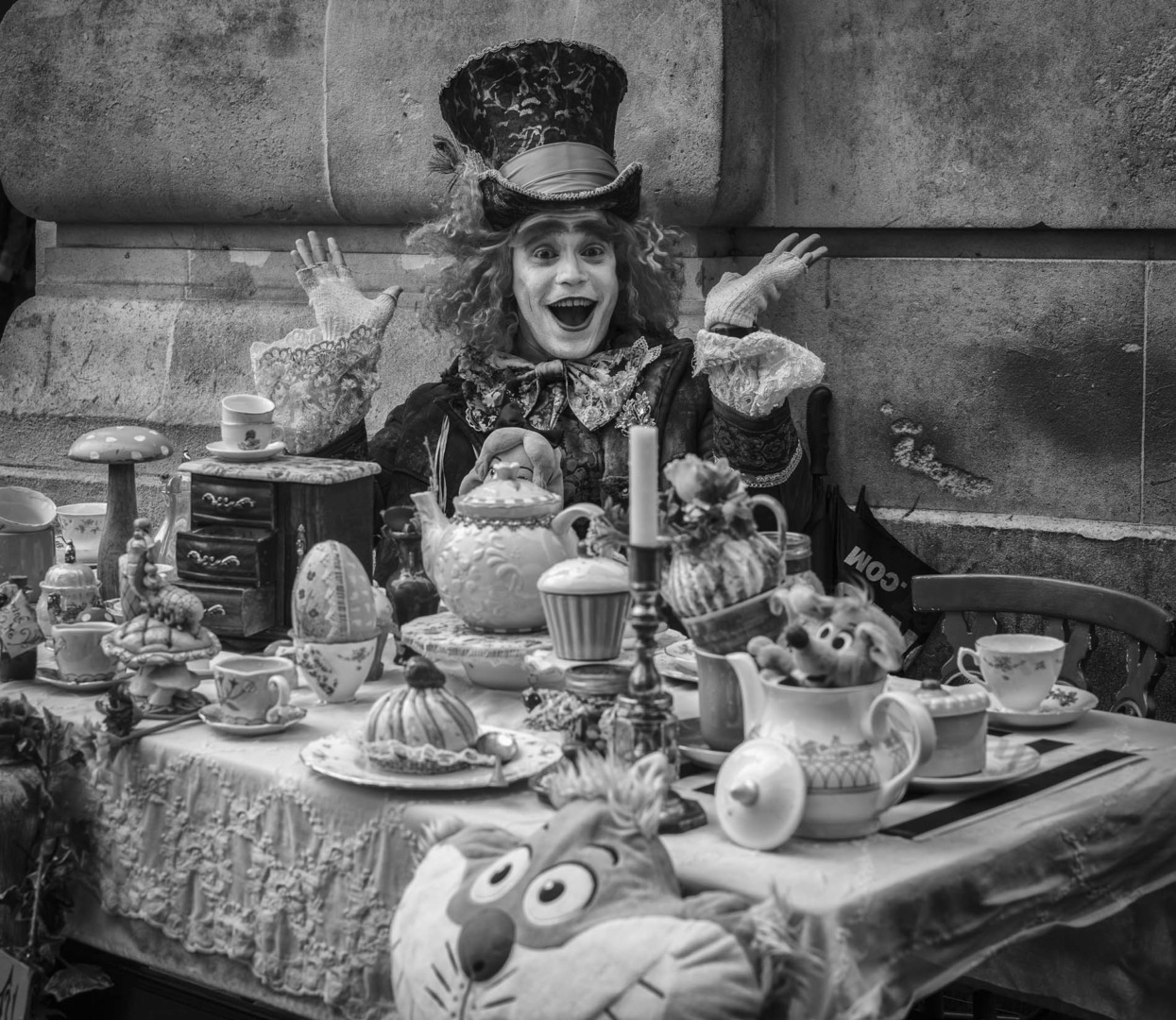 Street artist portraying the Mad Hatter's Tea Party