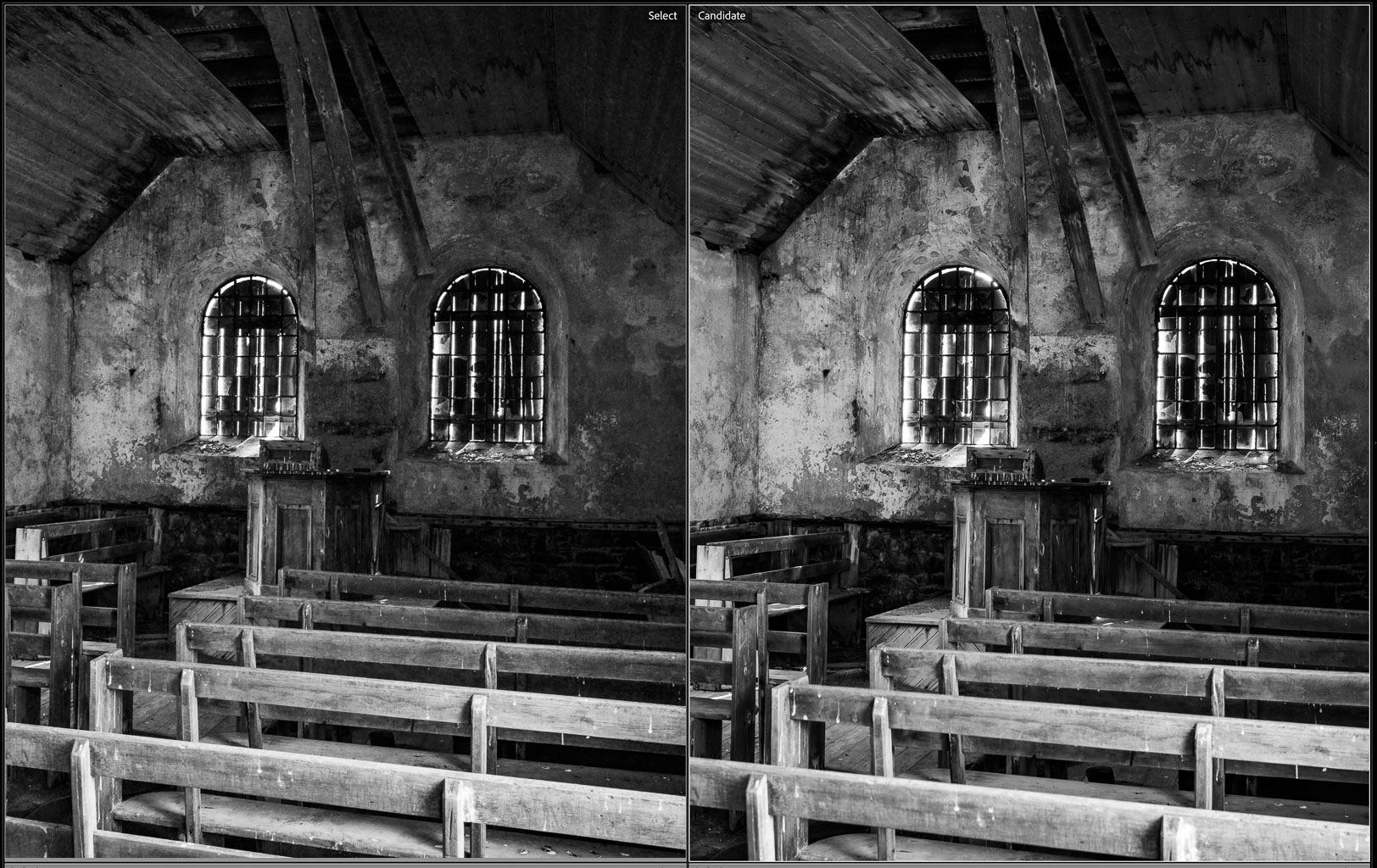 Black and white image of an abandoned interior resembling a church, featuring wooden benches, a pulpit, and barred windows, with peeling walls and a rustic ceiling.