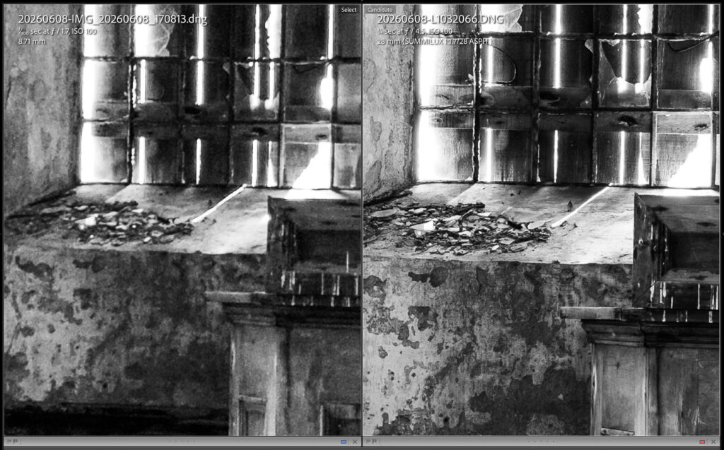 A dimly lit room featuring old, weathered walls and a window with multiple glass panes. The floor is scattered with debris, and a wooden surface is partially visible.