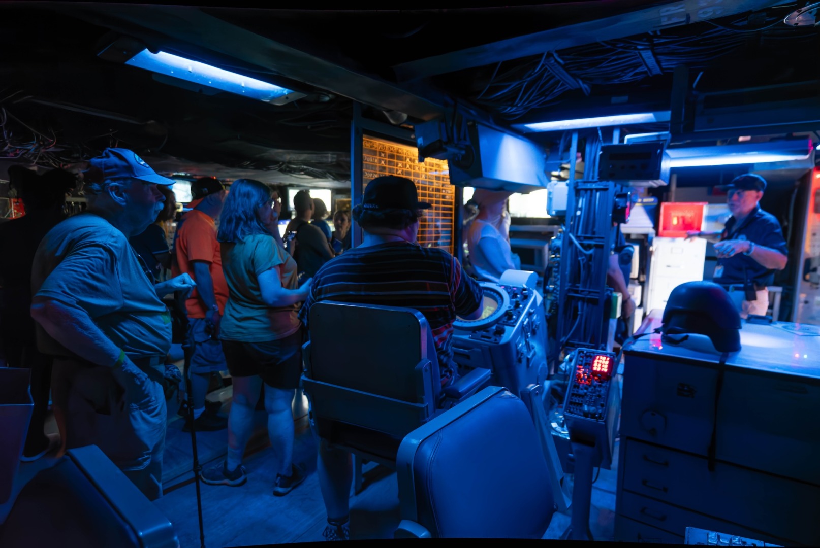 Dimly-lit interior of a warship.