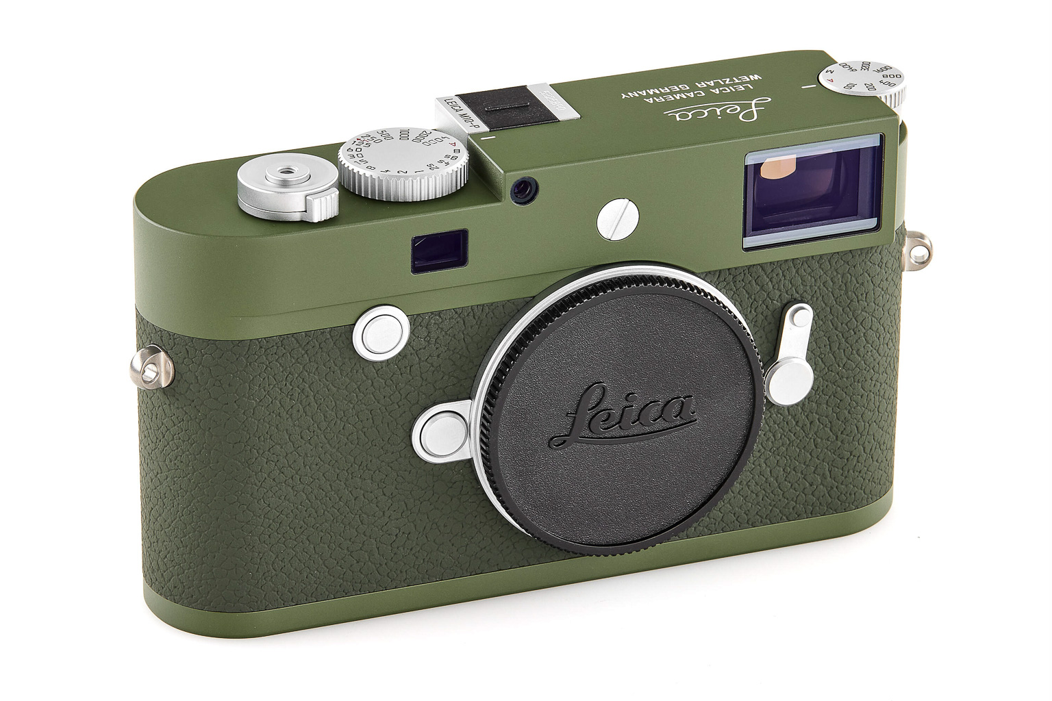 A green Leica camera with a textured grip, featuring various dials and a lens cap.