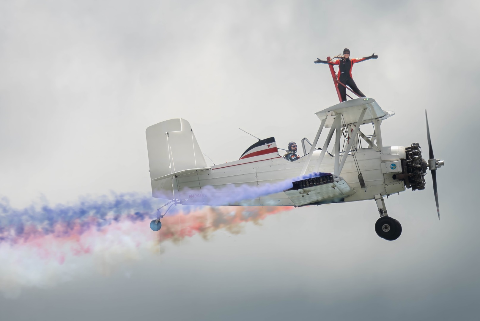 White plane against clouds