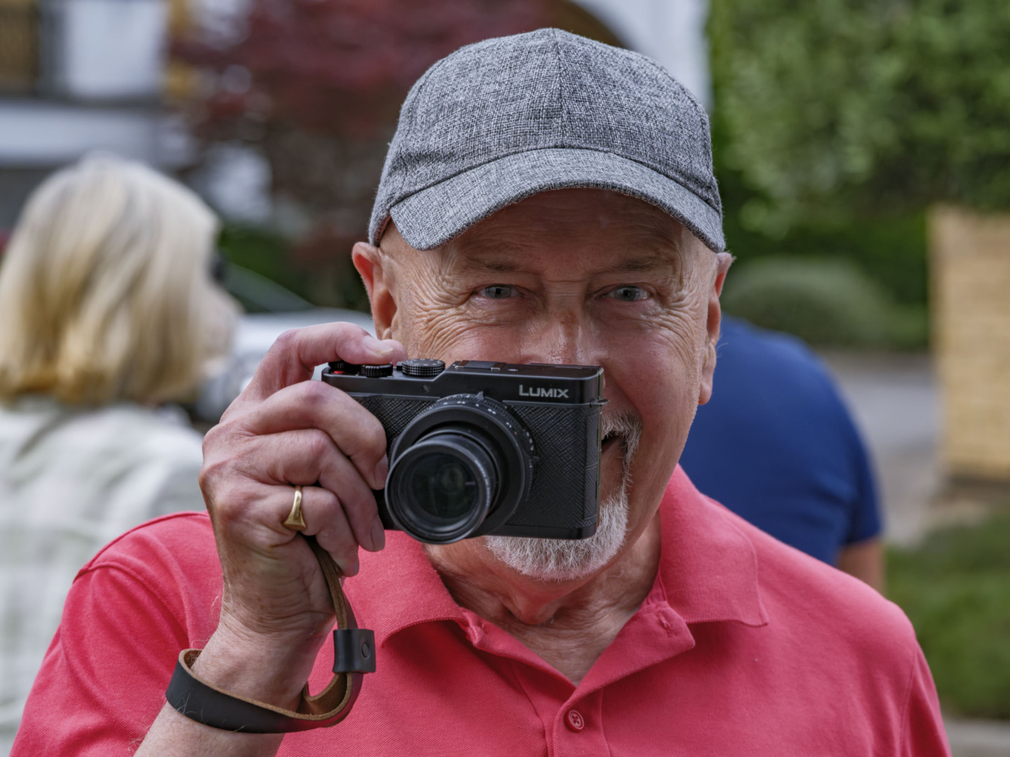 Man with Lumix L10 camera