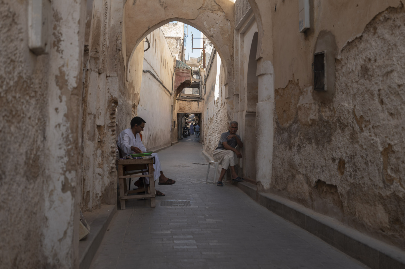 Time for a chat, two men in Medina