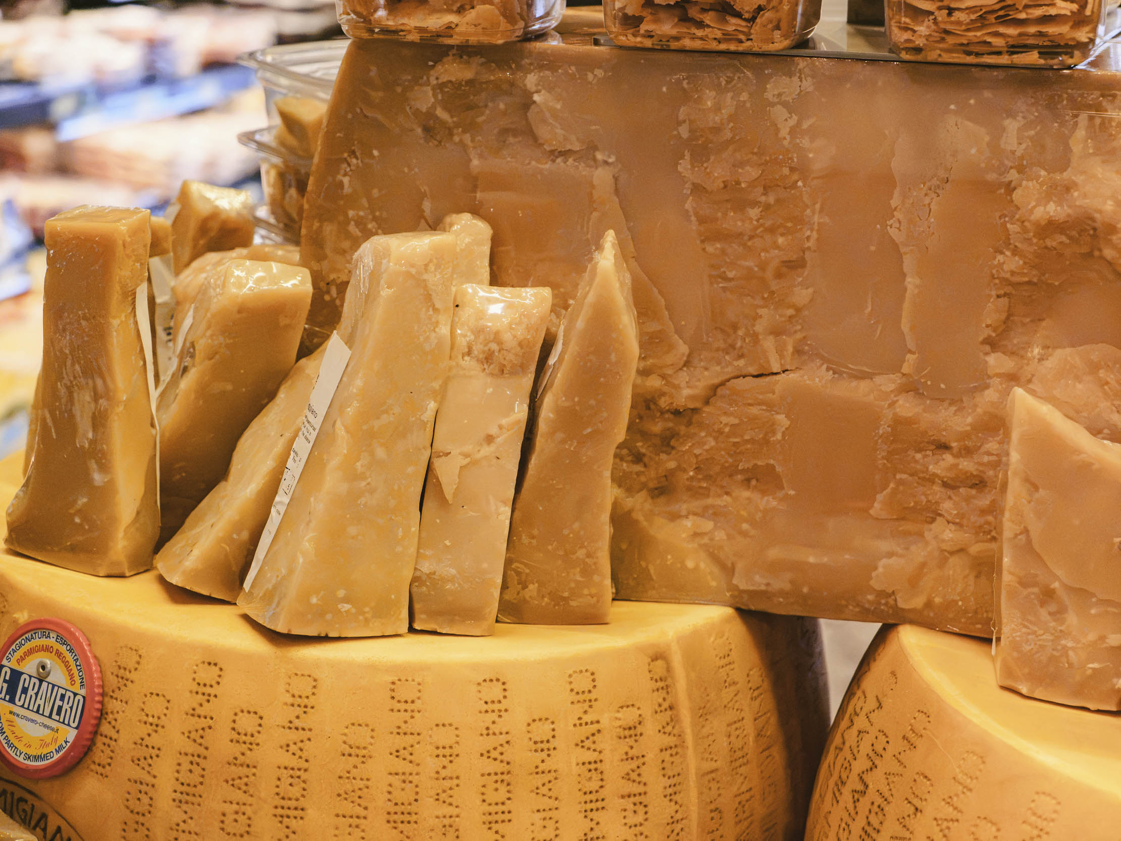 Blocks of cheese in supermarket