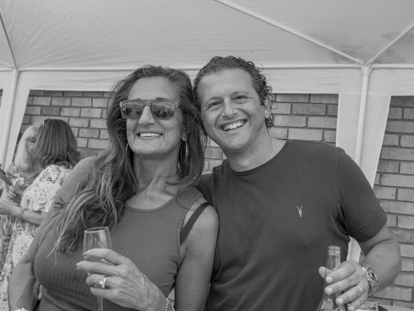 Couple drinking at party