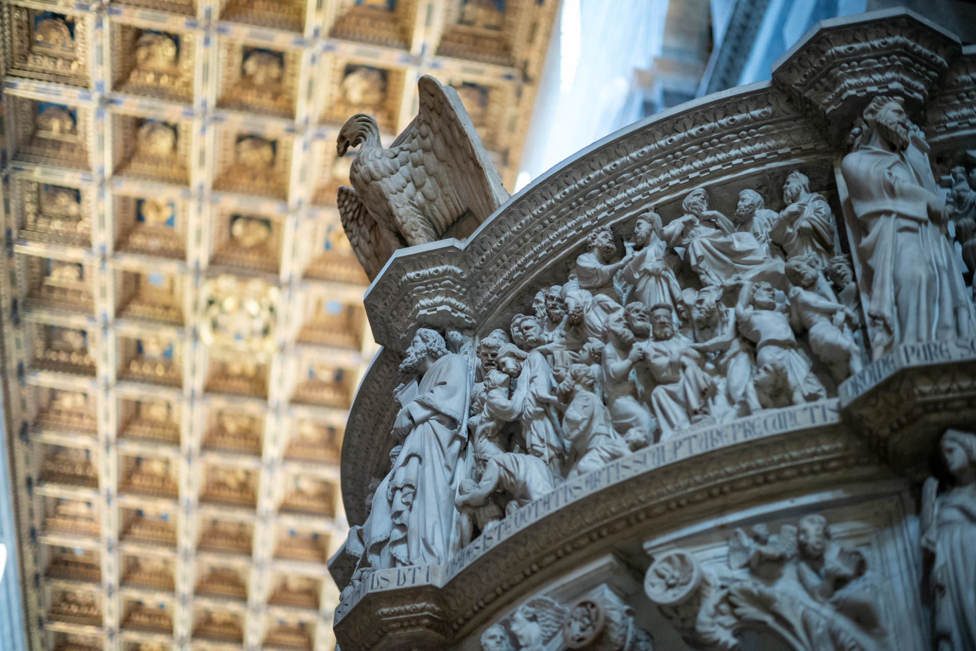 Sample shot with Thypoch Simera 50/1.4: carved figures and an eagle lectern on the cathedral pulpit, Duomo di Pisa, Italy.