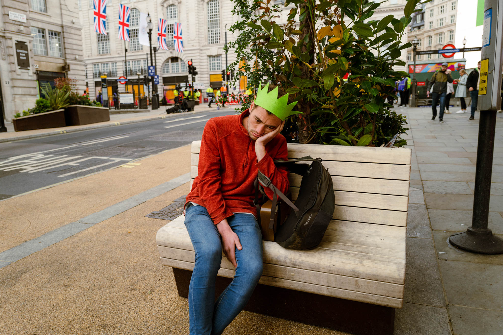 Sad king on bench