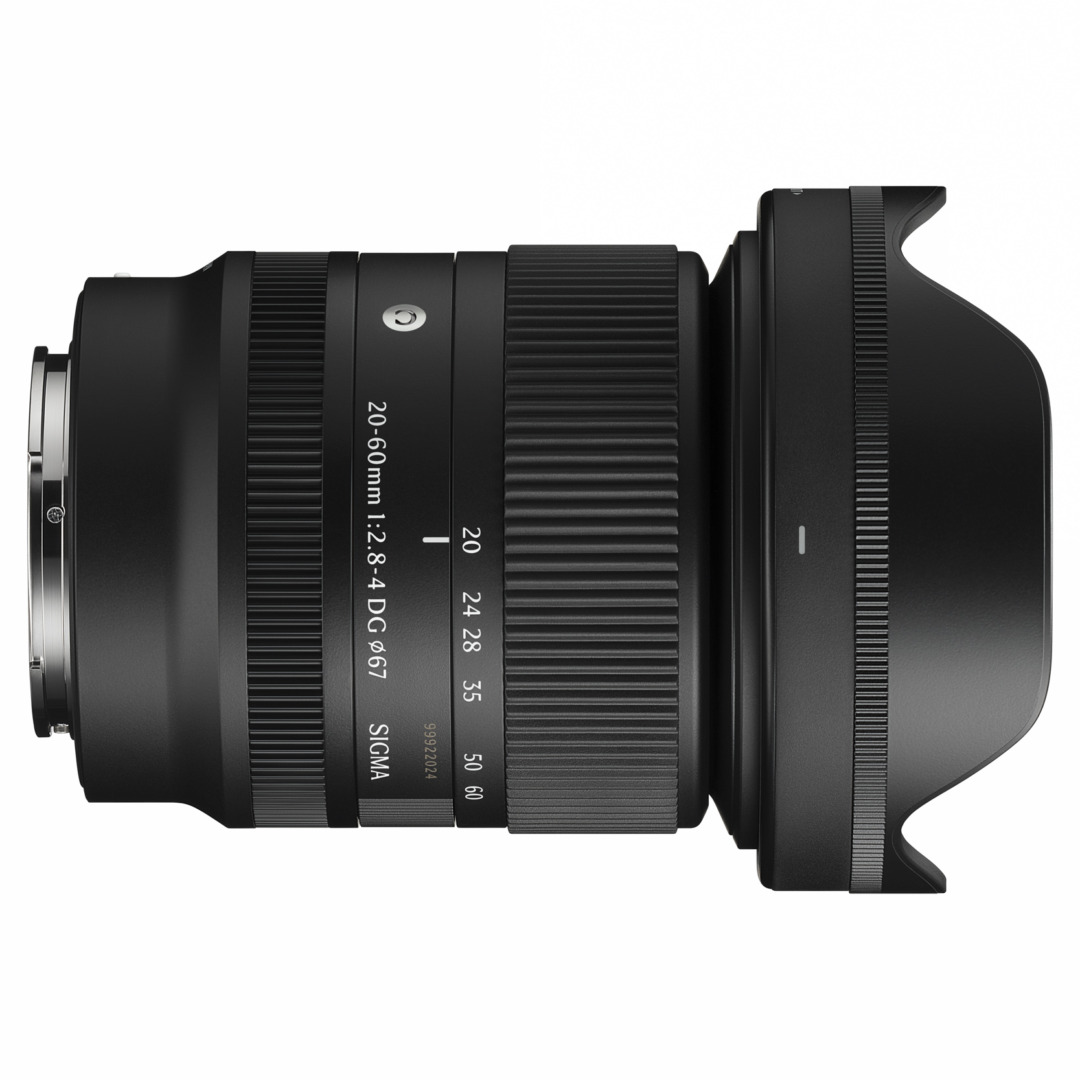 Sigma 20-60mm lens viewed from above, showing the zoom scale (20, 24, 28, 35, 50, 60) and lens hood, against a white background.