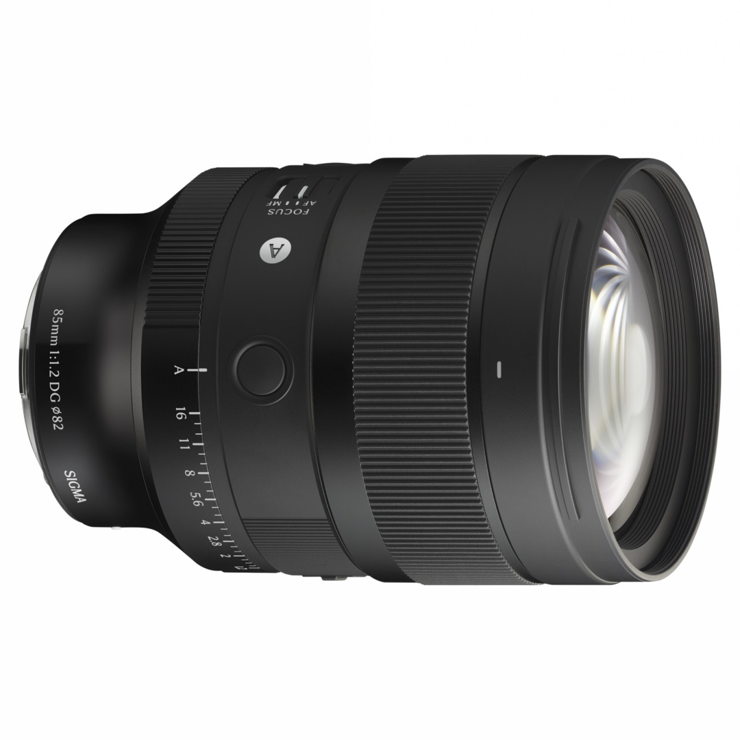 Three-quarter view of the Sigma 85mm f/1.2 lens showing its front element and focus switch, against a white background.
