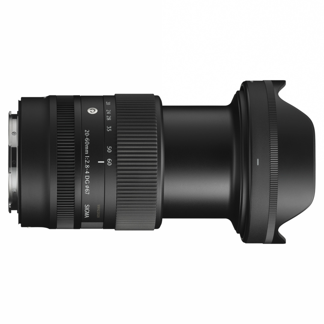 Side view of the Sigma 20-60mm lens with its hood attached, against a white background.