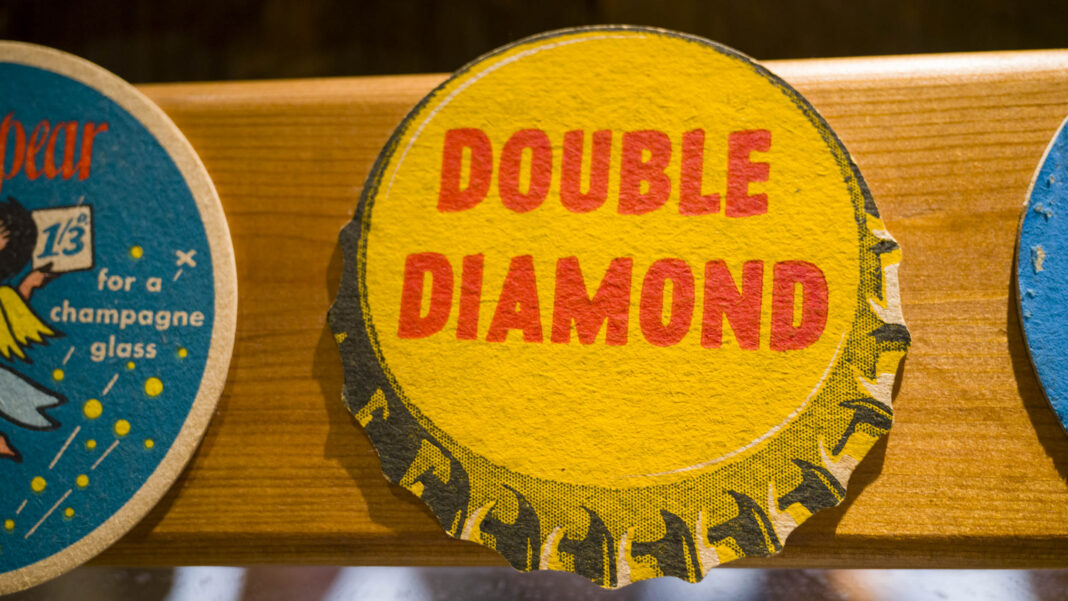 Double Diamond beer mat close up