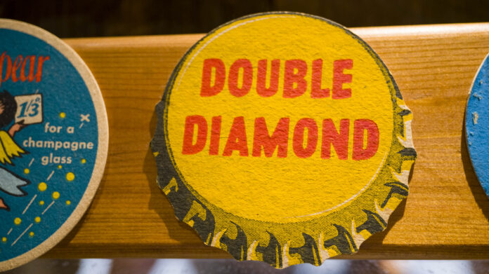 Double Diamond beer mat close up