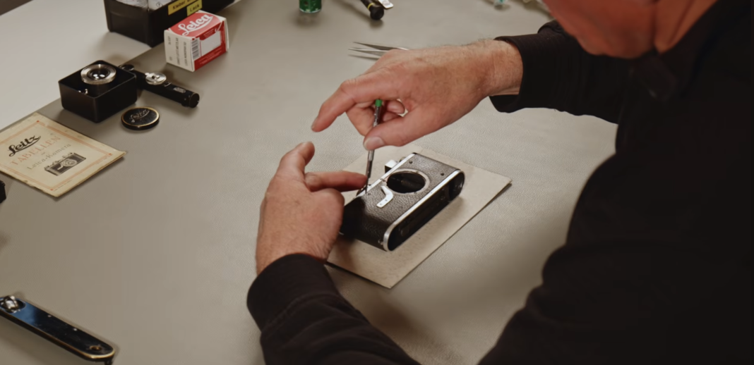 Leica I camera being repaired