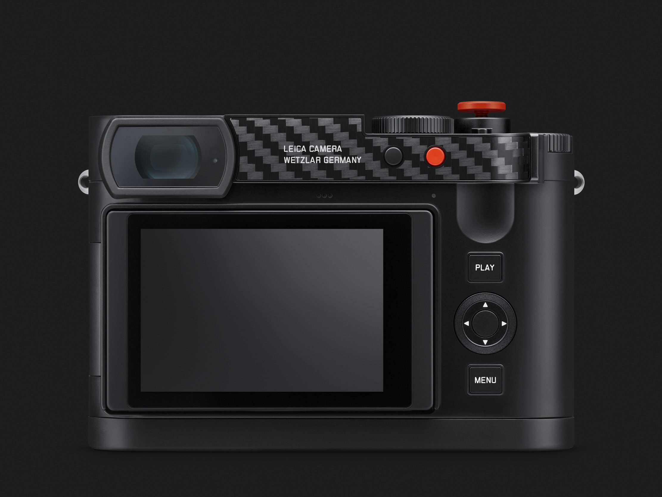 Rear view of the camera showing the rear screen, Play and Menu buttons, and a carbon fibre thumb rest engraved Leica Camera Wetzlar Germany with a red function button.